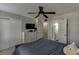 This bedroom has a ceiling fan and access to an ensuite bathroom at 6606 Wellington Sq, Norcross, GA 30093