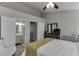 Bright bedroom boasting a ceiling fan, closet, and ensuite bathroom at 6606 Wellington Sq, Norcross, GA 30093