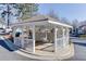 The neighborhood mailboxes are located in a gazebo on a sunny day at 6606 Wellington Sq, Norcross, GA 30093