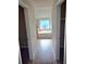 Bathroom with a tub and shower and natural light from one window at 2622 Glenbrook, Loganville, GA 30012
