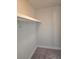Walk in closet with wire shelf and plush carpeting at 2622 Glenbrook, Loganville, GA 30012