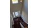 Open foyer with hardwood floors and natural light from front door and transom window at 2622 Glenbrook, Loganville, GA 30012
