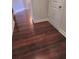 Hallway featuring dark laminate wood flooring at 2622 Glenbrook, Loganville, GA 30012