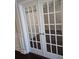 Bright office space featuring glass French doors, hardwood floors, and traditional trim at 2622 Glenbrook, Loganville, GA 30012