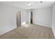 An empty bedroom with new carpet and ample closet space at 3103 Mote Rd, Covington, GA 30016