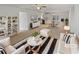 Bright living room with modern furniture, decor, and adjacent dining area at 3103 Mote Rd, Covington, GA 30016