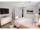 Serene main bedroom with neutral tones and a large bed with calming decor at 3103 Mote Rd, Covington, GA 30016