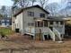 Expansive backyard with a large deck, perfect for outdoor entertaining and enjoying the serene surroundings at 457 Rockborough Ter, Stone Mountain, GA 30083