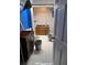 Bathroom features new cabinets, flooring, and fixtures in need of renovation at 457 Rockborough Ter, Stone Mountain, GA 30083