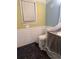 Bathroom features a window and fixtures in need of renovation at 457 Rockborough Ter, Stone Mountain, GA 30083