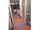 Dining room showcases brick wall, natural light, and requires new flooring at 457 Rockborough Ter, Stone Mountain, GA 30083