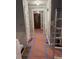 Entry hall featuring an oval front door, gray walls, and tan floor covering during renovation at 457 Rockborough Ter, Stone Mountain, GA 30083