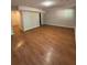 Spacious finished basement with durable wood-look floors and recessed lighting at 1098 Westfield Se Trce, Smyrna, GA 30082