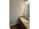Bathroom features granite countertop vanity and hardwood floors at 1098 Westfield Se Trce, Smyrna, GA 30082
