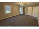 Large bedroom features neutral carpet, ceiling fan, and closet space at 1098 Westfield Se Trce, Smyrna, GA 30082