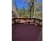 Open deck offers outdoor relaxation and entertainment space with privacy from surrounding trees at 1098 Westfield Se Trce, Smyrna, GA 30082