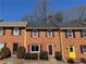 Well-maintained brick townhomes boasting uniform design and landscaping in a serene neighborhood at 1098 Westfield Se Trce, Smyrna, GA 30082