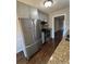 Modern kitchen featuring stainless steel appliances, granite countertops, and sleek gray cabinetry at 1098 Westfield Se Trce, Smyrna, GA 30082