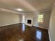 Spacious living room with fireplace, hardwood floors, and lots of natural light at 1098 Westfield Se Trce, Smyrna, GA 30082