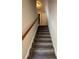 Carpeted stairway leads to the upper level of the home at 1098 Westfield Se Trce, Smyrna, GA 30082