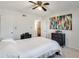 Bedroom features carpet, ceiling fan, and access to ensuite bathroom at 1229 Church St # C, Decatur, GA 30030