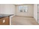 Bright dining area featuring a large window and open space at 148 Henley St, Canton, GA 30114