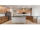 Kitchen featuring stainless steel appliances and light wood cabinets at 148 Henley St, Canton, GA 30114