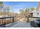 Back deck view overlooking backyard with wooden railing and trees in the distance at 23 Knollwood Nw Way, Cartersville, GA 30121