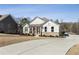 Desirable single-Gathering home with a manicured lawn and an extended driveway at 23 Knollwood Nw Way, Cartersville, GA 30121