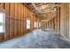 Large, unfinished basement with concrete floor, wood framing, and visible ductwork, ready to be transformed at 30 Grand Georgian Ne Ct, Cartersville, GA 30121