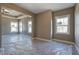 Bright bedroom with neutral walls, tray ceiling, ceiling fan and three windows at 30 Grand Georgian Ne Ct, Cartersville, GA 30121