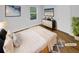 Cozy bedroom with neutral tones, wood floors, and a large window for ample natural light at 1950 S Inlet, Marietta, GA 30066
