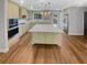 Beautiful kitchen with a large island, stainless steel appliances, and plenty of natural light at 1950 S Inlet, Marietta, GA 30066