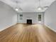 Bright and airy living room featuring hardwood floors, a fireplace, and large windows at 1950 S Inlet, Marietta, GA 30066