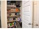 Large walk-in closet with ample storage shelves and rods at 2268 Redfern Rd, Dacula, GA 30019