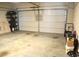 Spacious two-car garage with a standard door and plenty of storage space at 2268 Redfern Rd, Dacula, GA 30019