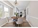 Charming kitchen nook with bright windows and dining area at 3540 Honeycomb Se Dr, Conyers, GA 30094