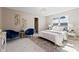 Serene main bedroom with carpet, lots of light, and a view to the main bathroom at 3540 Honeycomb Se Dr, Conyers, GA 30094