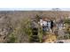 Aerial view of neighborhood showcasing homes in a wooded area and a beautiful tree canopy at 750 Clemont Ne Dr, Atlanta, GA 30306