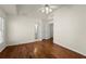 Bedroom with ceiling fan, two closets, hardwood floors, and natural light at 1245 Village Terrace Ct, Dunwoody, GA 30338
