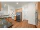 Bright kitchen featuring stainless steel appliances, granite countertops, and hardwood floors at 1245 Village Terrace Ct, Dunwoody, GA 30338