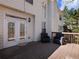 A back deck is furnished with chairs, offering a relaxing outdoor space at 1755 Presidents Dr, Lawrenceville, GA 30043