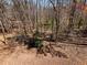 A wooded backyard offers a natural setting for privacy and outdoor enjoyment at 1755 Presidents Dr, Lawrenceville, GA 30043
