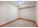 Cozy bedroom featuring neutral carpeting and a simple, modern light fixture at 1755 Presidents Dr, Lawrenceville, GA 30043