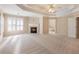 Spacious bedroom with a fireplace, trey ceiling, large windows and neutral decor creates a warm and inviting atmosphere at 1755 Presidents Dr, Lawrenceville, GA 30043