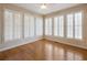 Sun-filled bonus room with hardwood floors and an abundance of natural light at 1755 Presidents Dr, Lawrenceville, GA 30043