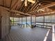 This wooden deck features a ceiling with fans and overlooks the community tennis court at 1755 Presidents Dr, Lawrenceville, GA 30043