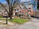 Charming brick home with well-maintained lawn, mature trees, and a welcoming front entrance at 1755 Presidents Dr, Lawrenceville, GA 30043