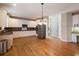 Gourmet kitchen with stainless steel appliances, custom cabinets, and granite countertops at 1755 Presidents Dr, Lawrenceville, GA 30043