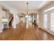 Spacious living room with hardwood floors, fireplace, archways and natural light at 1755 Presidents Dr, Lawrenceville, GA 30043